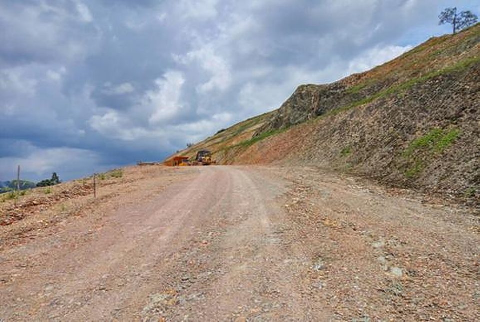 Earthworks cutting through a hillside for a new road