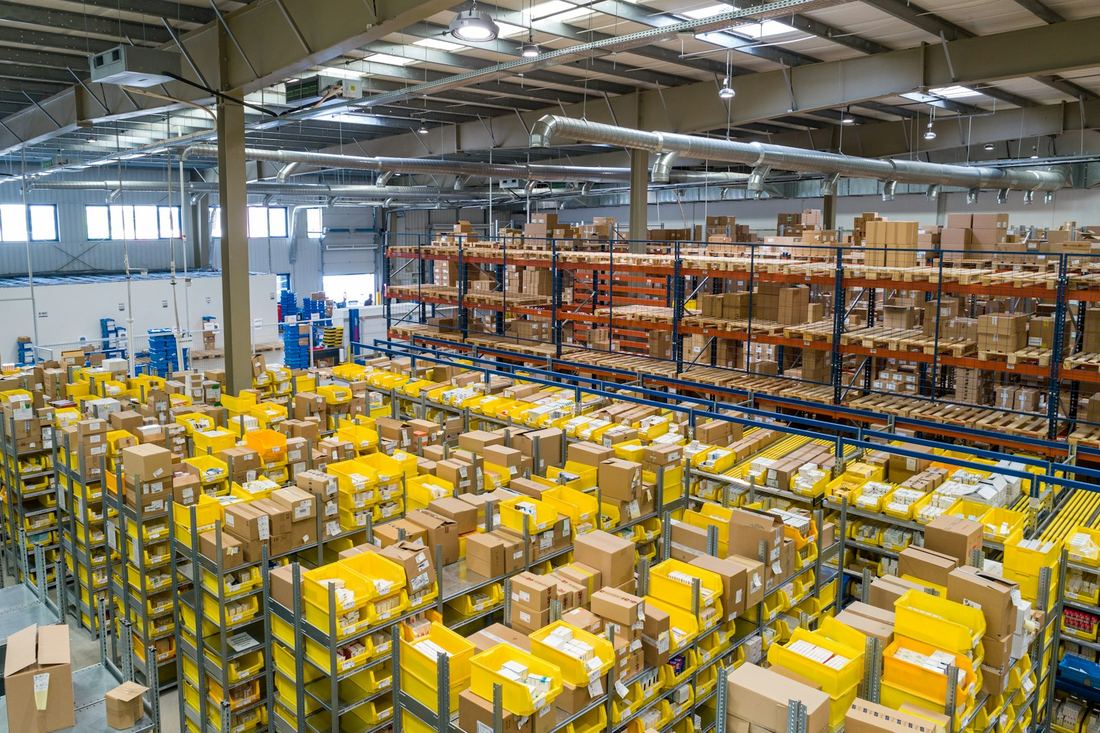Aerial view of a warehouse with stacked goods